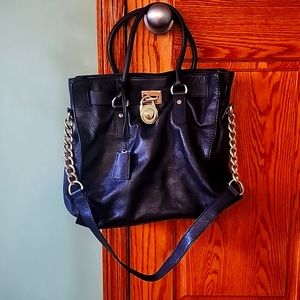 Micheal Kors vintage handbag black with gold chains and lock